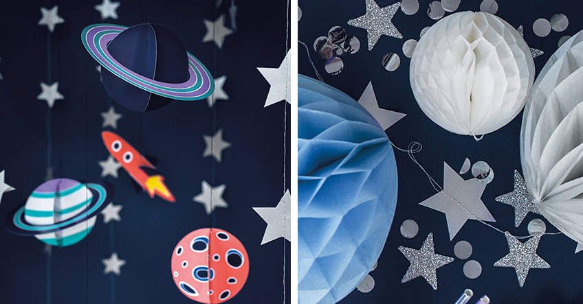 Weltraum-Motive und Wabenbälle dekorieren den Weltraum-Geburtstag perfekt