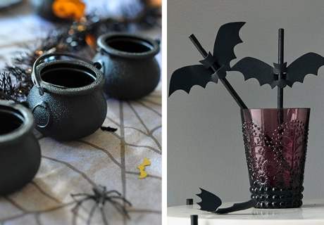 Verwende in der Tischdeko elegante Halloween-Motive wie Hexenkessel und Fledermäuse